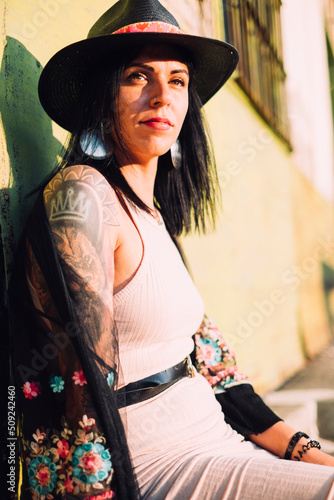 Young tattooed woman summer portrait