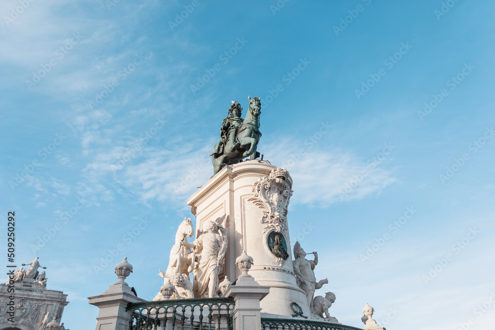 Obraz premium Statue of Don José I in Lisbon is beautiful with a blue sky. Journey to Lisbon, Portugal. Commerce Square
