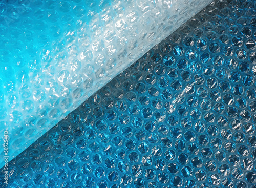 Air bubble wrap, protective plastic sheet. Shiny close up template shot, of a material used for safety on product delivery