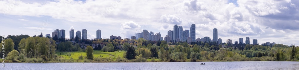 Panoramic View of Residential Apartment Home Buildings in Metrotown. Green Trees in Deer Lake Park, Burnaby, Vancouver, BC, Canada. Panoramic View of Residential Apartment Home Buildings in Metrotown. Green Trees in Deer Lake Park, Burnaby, Vancouver, BC, Canada.