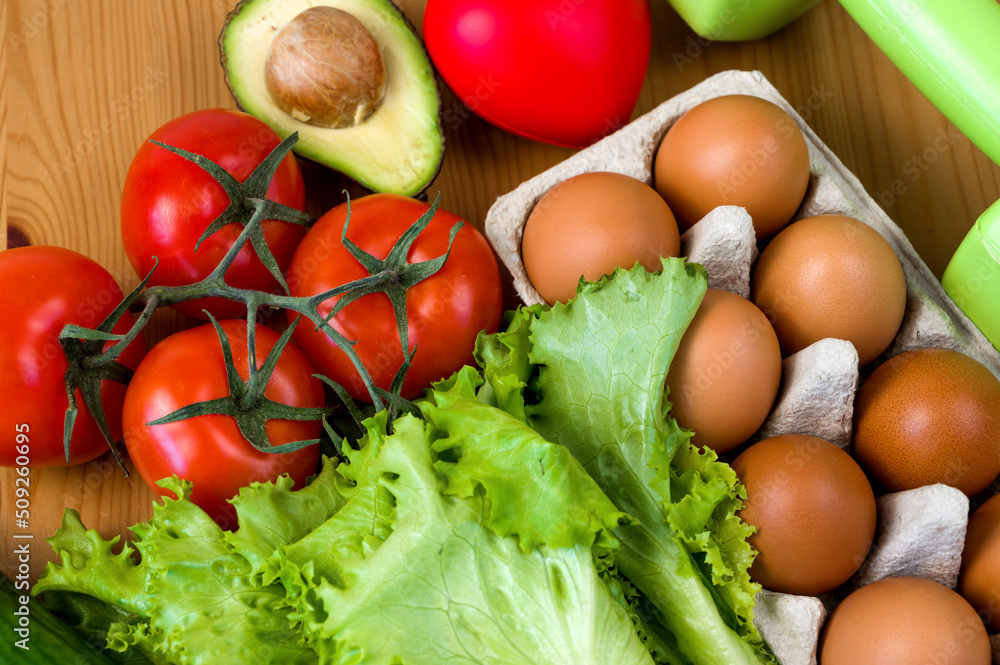 Vegetables and eggs on the table.Flat lay.HEalthy lifestyle and keto diet Vegetables and eggs on the table.Flat lay.HEalthy lifestyle and keto diet