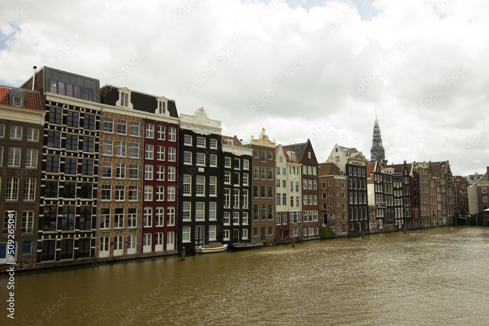 Houses at Damrak in the city of Amsterdam