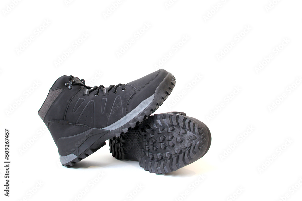 Hiking boots for men or women who want to do mountain walks with a firm anti-slip sole that gives stability and freedom of movement for adventure on vacation or weekend Hiking boots for men or women who want to do mountain walks with a firm anti-slip sole that gives stability and freedom of movement for adventure on vacation or weekend