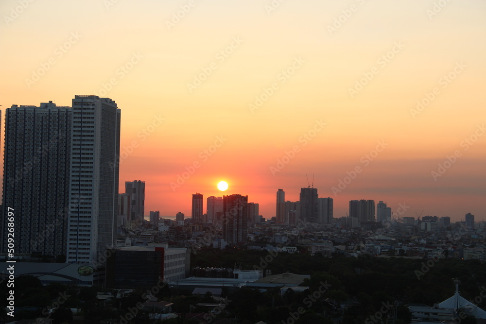 Sunset in Metro Manila skyscrapers, Manila, Philippines