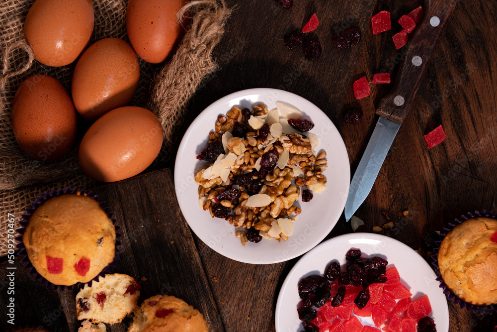 Fototapeta premium delicious homemade muffins with toasted nuts and seeds to enjoy with the family