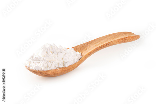 Photos White corn flour in wooden spoon isolated