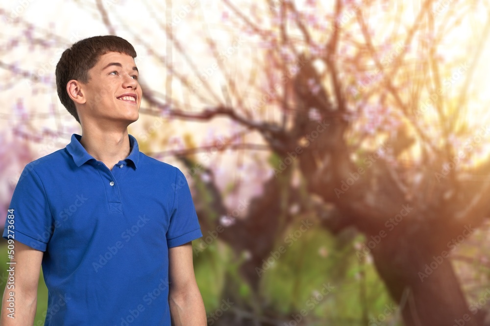 Relaxed man in a t-shirt on fresh air outdoors Relaxed man in a t-shirt on fresh air outdoors
