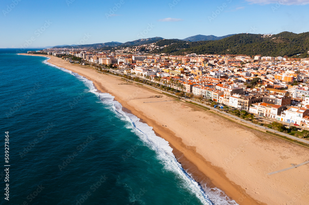 View from drone of Mediterranean seascape of Malgrat de Mar city, Catalonia, province of Barcelona