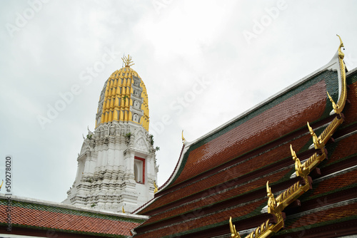 View of Phar Prang behind the wall. at Wat Phra Si Rattana Mahathat. photo
