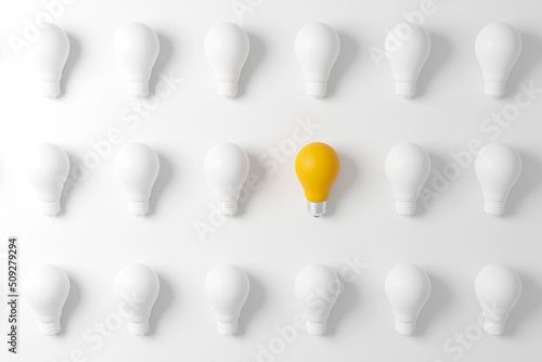 Obraz na płótnie Pattern light bulb yellow outstanding among lightbulb group