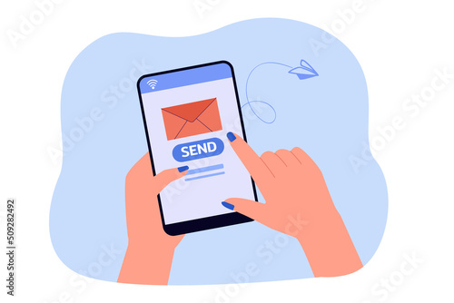Hand holding smartphone with envelope and send button on screen. Person sending letter via mobile app flat vector illustration. Technology, internet, communication concept for banner or landing page