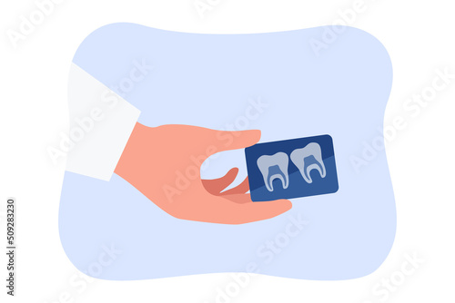 Doctor holding dental X-ray flat vector illustration. Dentist holding x-ray of human teeth. Stomatology, healthcare concept for banner, website design or landing web page