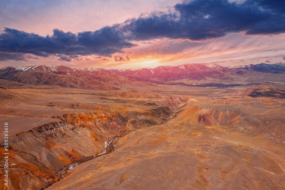 Landscape mountains Altai Republic Russia, texture of red sand in Mars valley, aerial top view with sunset