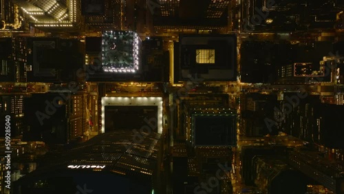 Aerial birds eye overhead top down view of night city around MetLife building and Grand Central station. Manhattan, New York City, USA