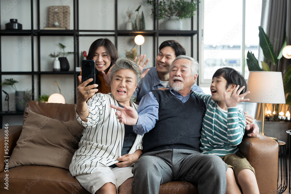 Asian big family taking selfie together at home. Asian big family taking selfie together at home.
