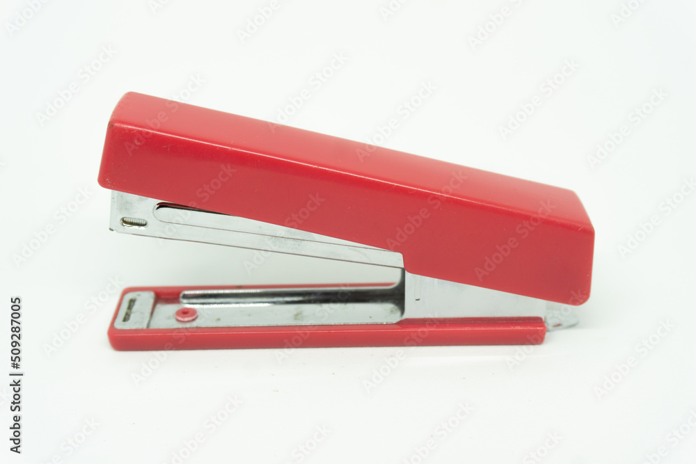 pink staples on a white background isolated pink staples on a white background isolated