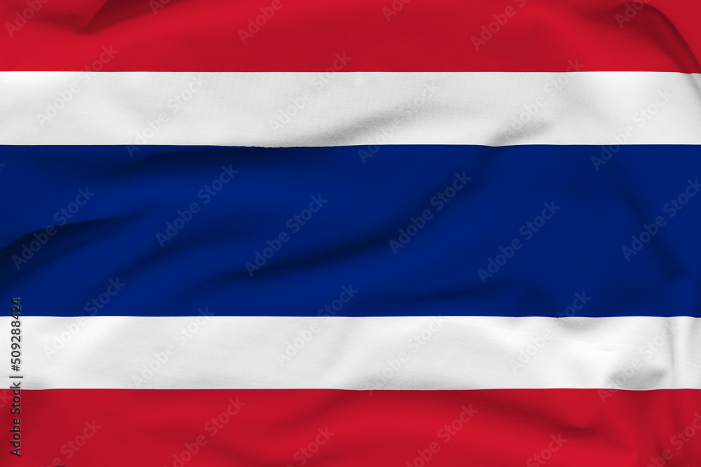 Naklejka premium Thailand national flag, folds and hard shadows on the canvas