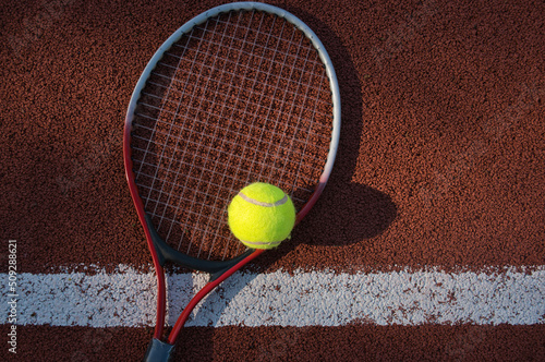 Tennis ball, racquet on hard court surface © NetPix