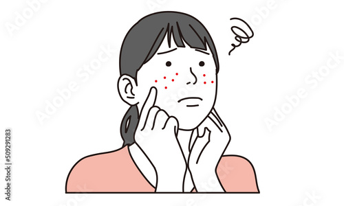 肌荒れに悩む女性