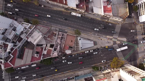 Drone top view showing Cordoba Avenue fork in Buenos Aires city with busy vehicles after work photo