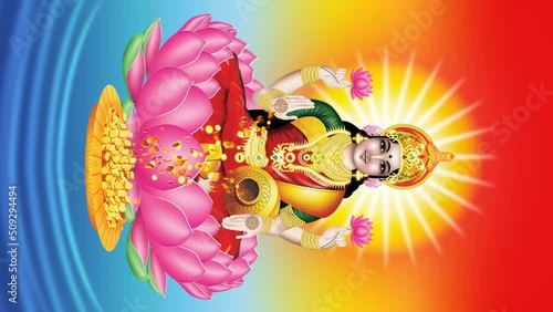 The god of wealth Lakshmi pouring golden coins