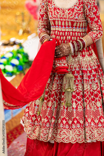 Indian Punjabi bride's red wedding outfit