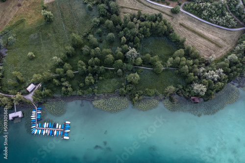 Fototapeta Naklejka Na Ścianę i Meble -  aerial view of al lakeshore with boats 