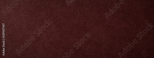 レザー調の質感のある茶色い紙の背景テクスチャー