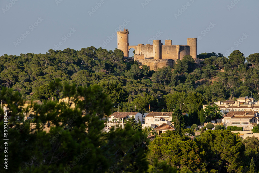 Bellver castle at dawn, seen from the town of Genova, Mallorca, Spain