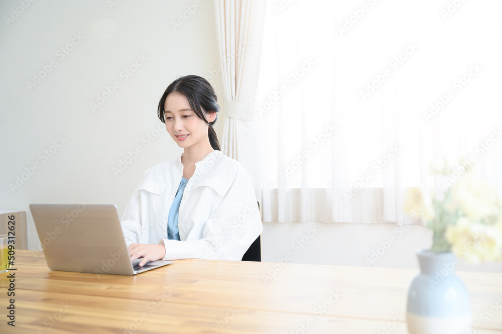 Beautiful woman working on a laptop Beautiful woman working on a laptop