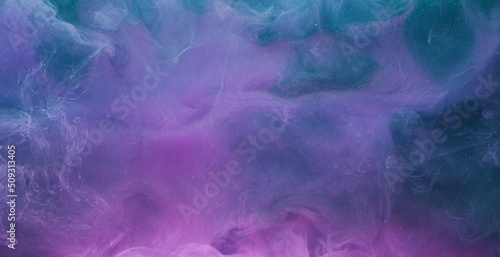 Ink water mix. Magic burst. Blue purple paint blend. Abstract art background shot on Red Cinema camera 6k.
