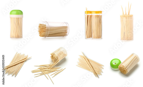 Set of wooden toothpicks on white background photo