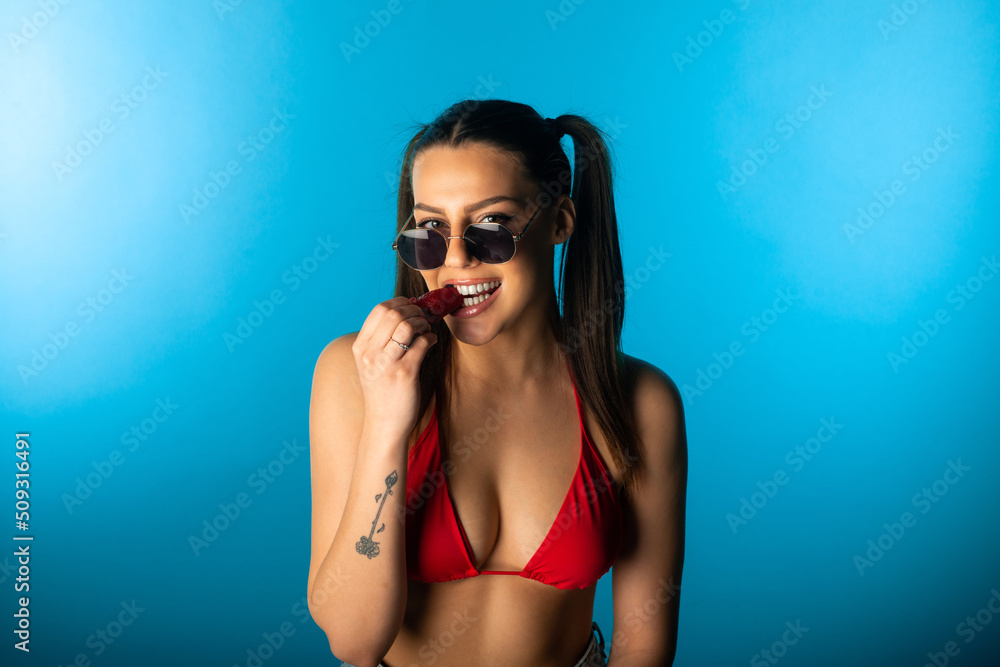 Fototapeta premium Girl is having a bite
