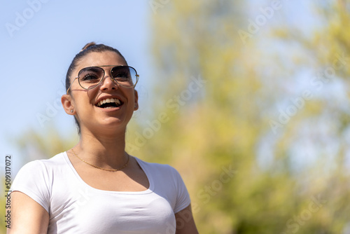 Photo of a beautiful woman in the park