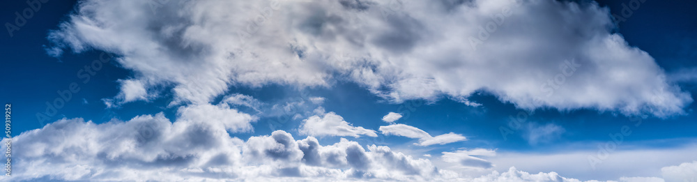 Real wide blue sky background with clouds of northern winter Sweden. panorama Real wide blue sky background with clouds of northern winter Sweden. panorama
