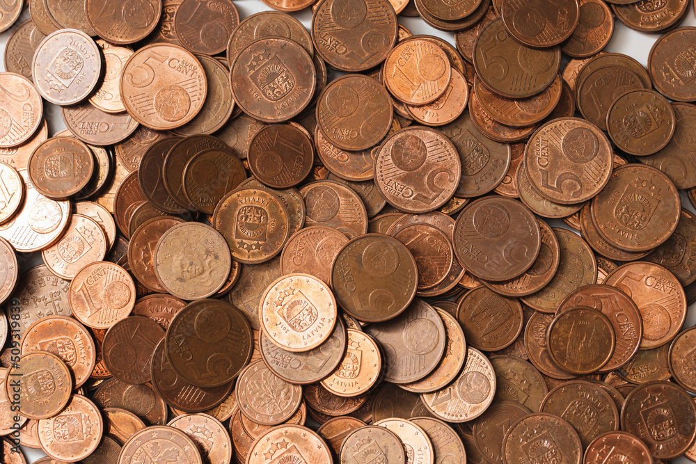 Large pile of shiny copper euro coins of small value. Large pile of shiny copper euro coins of small value.