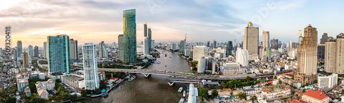 Aerial view of Saphan Taksin district near the Taksin bridge and Chao Phraya river, Bangkok, Thailand photo