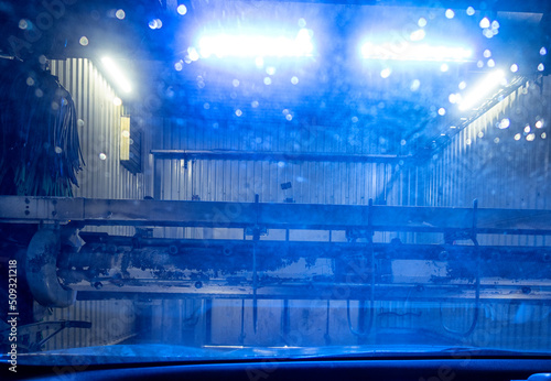 Automatic conveyorized tunnel car wash. A view from inside.
 photo