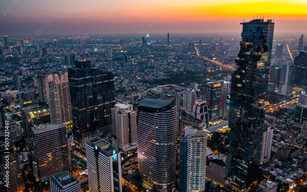 Fototapeta premium Aerial view of King Power Mahanakhon tower in Sathorn Silom central business district of Bangkok, Thailand