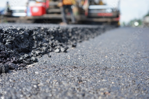 Blurred image of traffic paving work on the highway