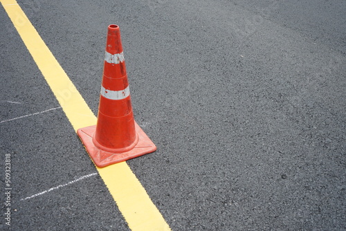 Road construction blur And the rubber cone is located in front
