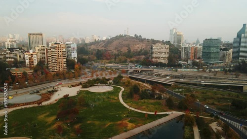 Aerial view of San Luis hill in Santiago city of Chile with daytime traffic on the road photo
