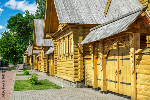 Bild auf Leinwand Traditional Russian wooden house made of wooden logs