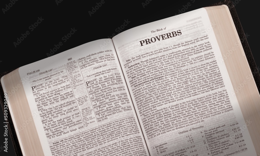 Open Bible with letters for the words of Jesus Christ, opened to the book on desk. Open Bible with letters for the words of Jesus Christ, opened to the book on desk.