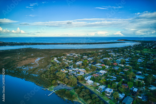 Aerial view looking downstream towards the mouth of the Barwon River near Barwon Heads, Victoria, Australia. May 2022.
 photo
