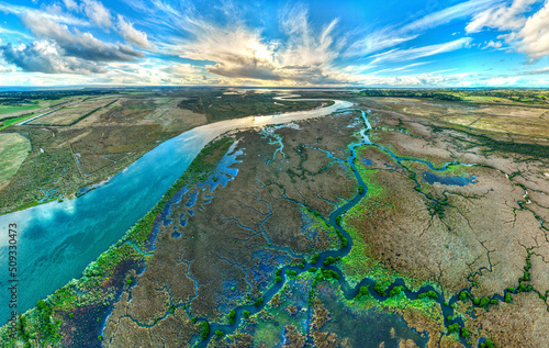 Drone view of the Barwon River and Lake Connewarre upstream of and Barwon Heads, Victoria, Australia.