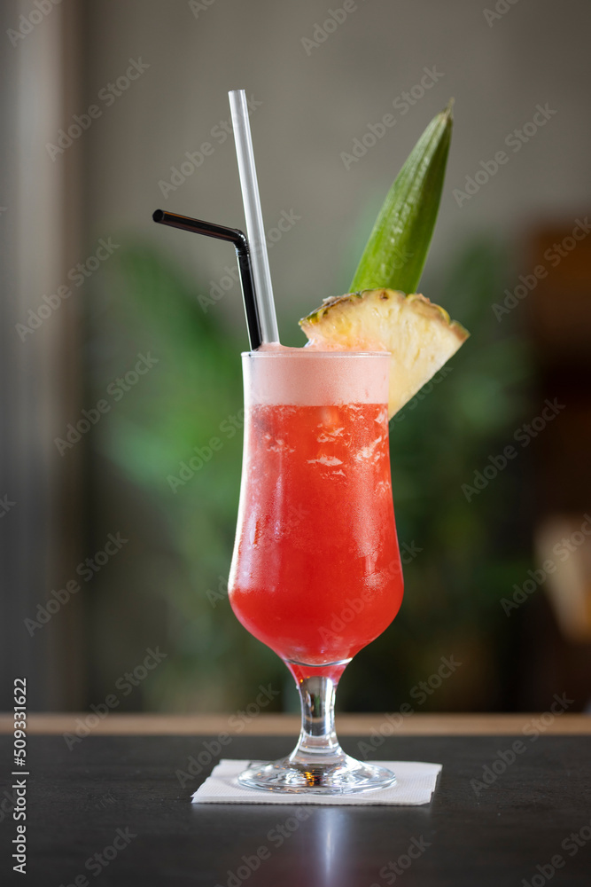 Strawberry pineapple cocktail served in a glass Strawberry pineapple cocktail served in a glass