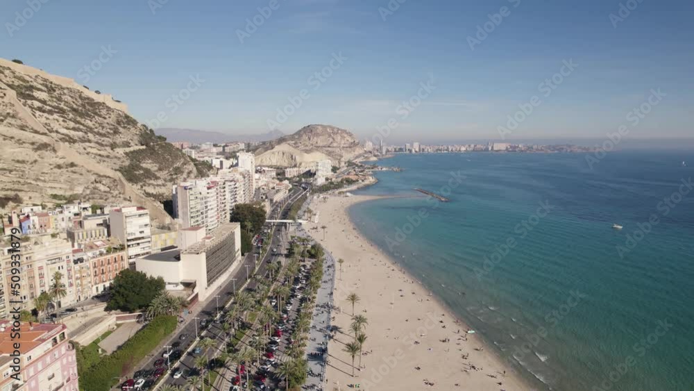Aerial backwards view over a beautiful beach in Alicante, Spain. Real time Aerial backwards view over a beautiful beach in Alicante, Spain. Real time