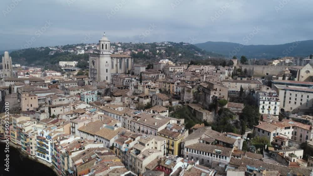Flying above old town area in Girona city, Spain. Flying above old town area in Girona city, Spain.