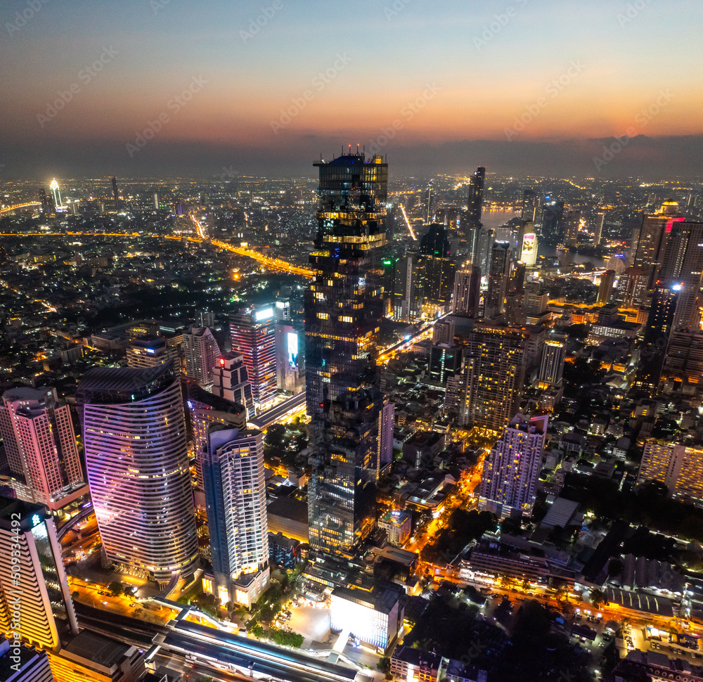 Fototapeta premium Aerial view of King Power Mahanakhon tower in Sathorn Silom central business district of Bangkok, Thailand